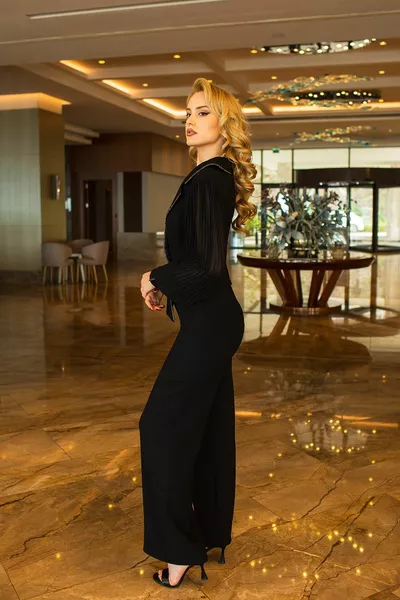 Geplooide jumpsuit met zwarte mouwen