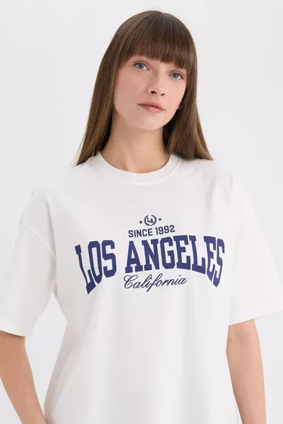 T-shirt à manches courtes oversize à col rond avec imprimé SP