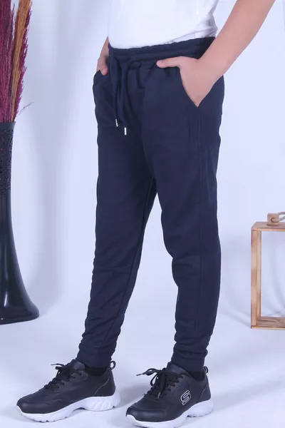 Pantaloni da tuta blu scuro da ragazzo con doppie tasche