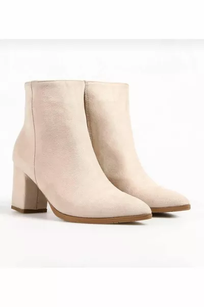 Bottes à talons pointus beige beige crème en daim à bout pointu