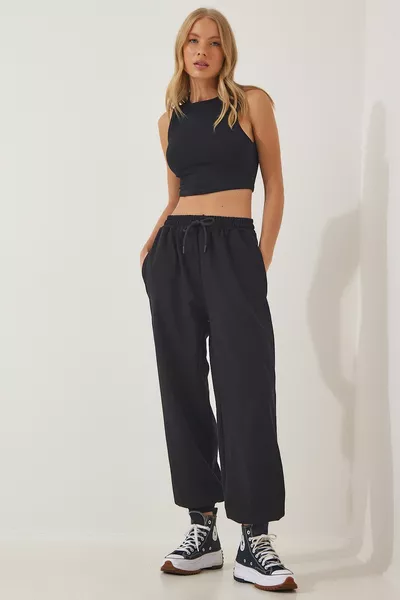 بنطال رياضي نسائي أسود فضفاض للركض 