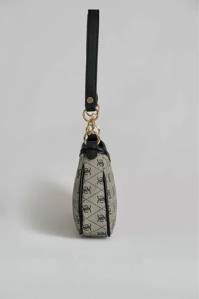 حقيبة كتف نسائية سوداء منقوشة