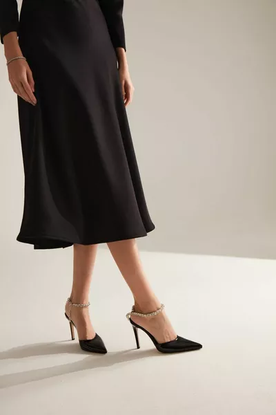 لوسي الكاحل الأسود جلد لامع الكعب