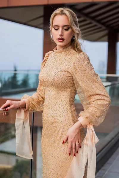 Maniche dorate fiocco pietra Hijab abito da sera