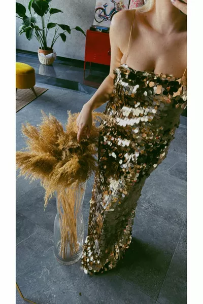 SEQUINED GOLD COLORED EVENING DRESS
