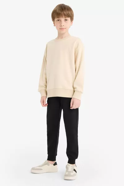 Pantaloni da jogging da scuola per ragazzo, neri, vita e caviglie elastiche con tasche AU