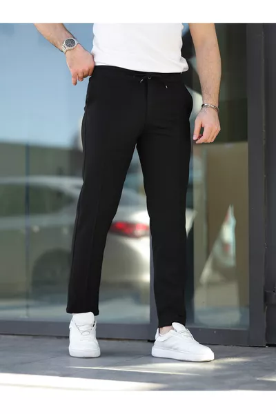 بنطال جوغر من قماش مريح أنيق سهل الكي بقصة مريحة ضيقة