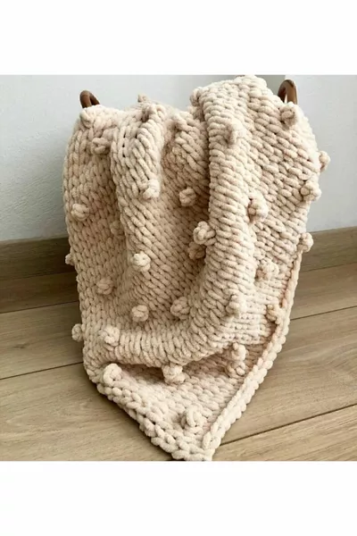 Babysdecke mit Silberknopf und Knospenmuster