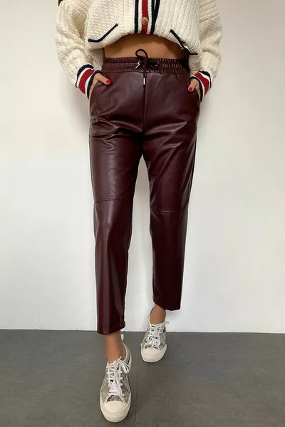 الدانتيل متابعة الركبة غرزة التفاصيل السراويل الجلدية