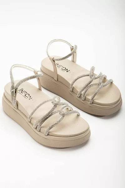  صنادل نسائية مبطنة بكعب بيج