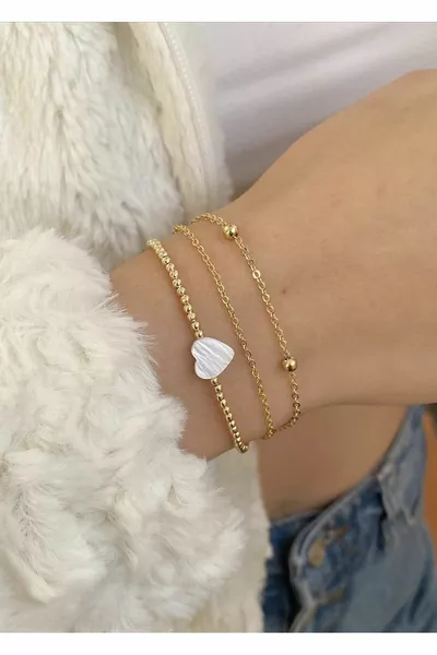 Комбинирана златна гривна със седефено сърце дорли