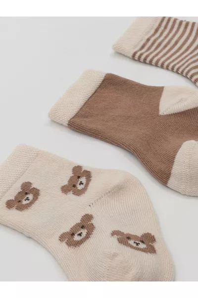 4 جوارب أطفال عضوية بدون درز بلون البيج / جوارب عضوية لحديثي الولادة (مزوَّدة بقاعدة سيليكون )