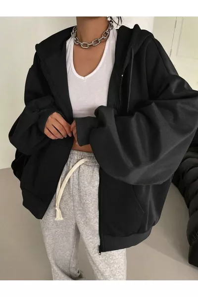 كنزة نسائية بأكمام بالون بسحّاب وتفاصيل على غطاء الرأس باللون الأسود