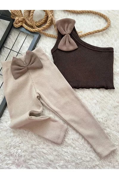 طقم للأطفال رضّع: تنورة قصيرة بكم واحد باللون البني ووشاح رأس