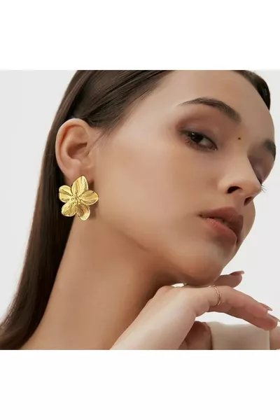 Orecchini con fiore con motivo femminile