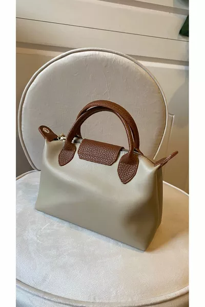 متجر حقائب نسائية بسحاب وإغلاق بزر مضغوط للكتف واليد