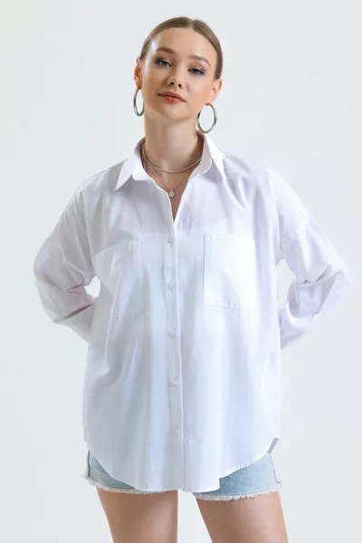 Chemise longue oversize en popeline de base à poches blanches pour femme