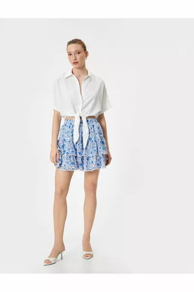 Mini-jupe fleurie à volants en viscose taille élastiquée