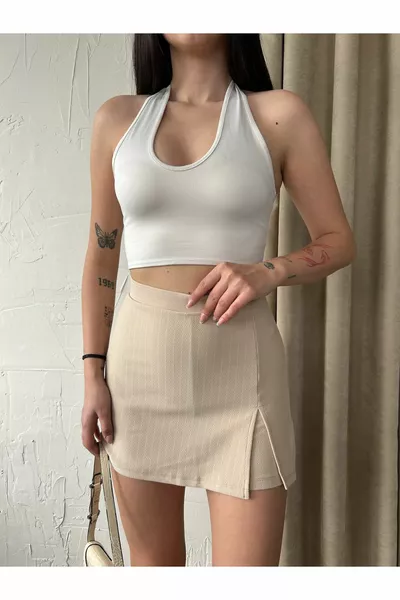 المرأة عالية الخصر خط منقوشة شق مفصلة السراويل البسيطة تنورة البيج