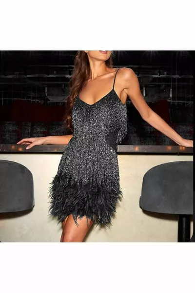 Tule avondjurk met kwastjes