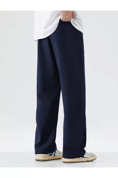 بنطال رياضي واسع القصة بلون كحلي مع أرجل مستقيمة وراحة في اللبس