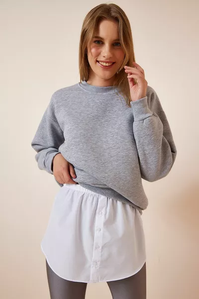 المرأة سترة بيضاء وقميص من النوع الثقيل أسفل تنورة قميص البوبلين 