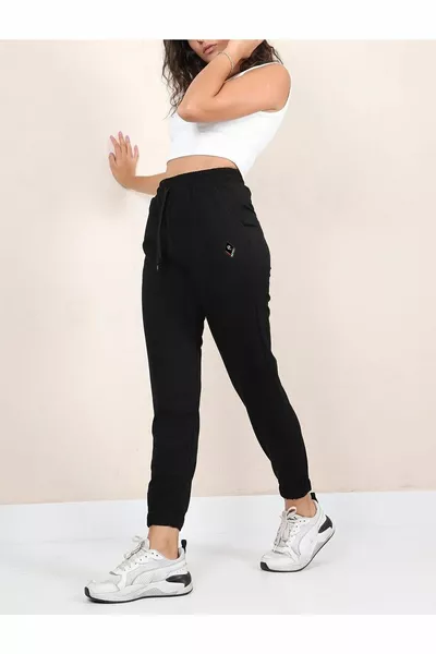 بنطال رياضي بخصر وساقين مطاطيين مطبوع بالأشعة فوق البنفسجية للجنسين