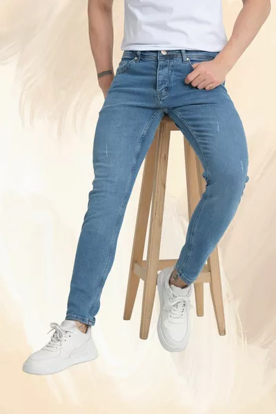 Heren spijkerbroek middenblauw destroyed smal skinny fit met knoopsluiting