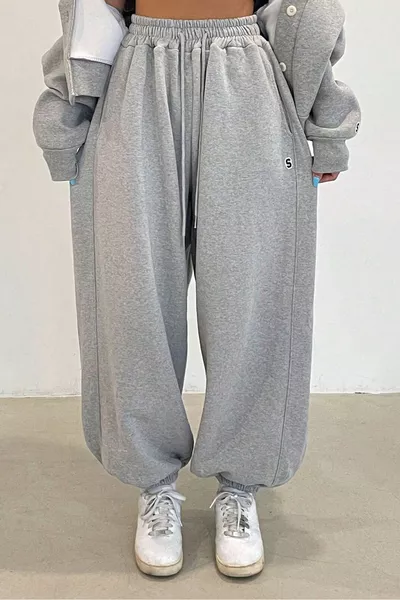 بنطال رياضي نسائي فضفاض من خيطين باللون الأسود