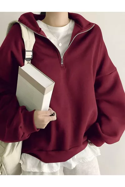 سويت شيرت نسائي برقبة عالية وسحّاب نصفية باللون البوردو