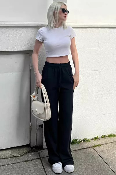 Pantalon femme femme à cordon de serrage à la taille noire 