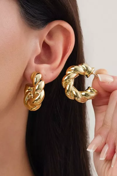 Orecchini a cerchio in acciaio grandi torsionati da donna importati