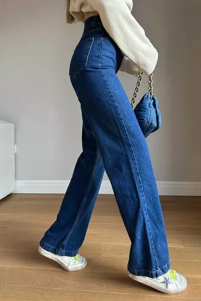 Jean en denim Palazzo à taille haute et jambes larges Tugy en bleu foncé avec stretch