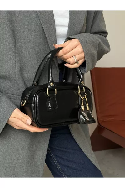 حقيبة يد وكتف نسائية من بوني موديل باللون الأسود مع قطعة شَارْم هدية