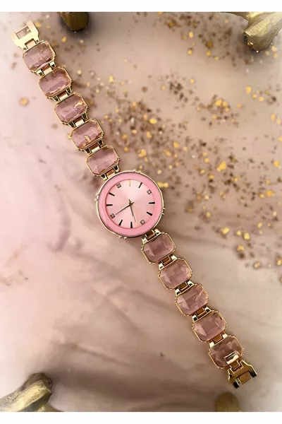 ساعة يد نسائية وردية بحجر مرصع