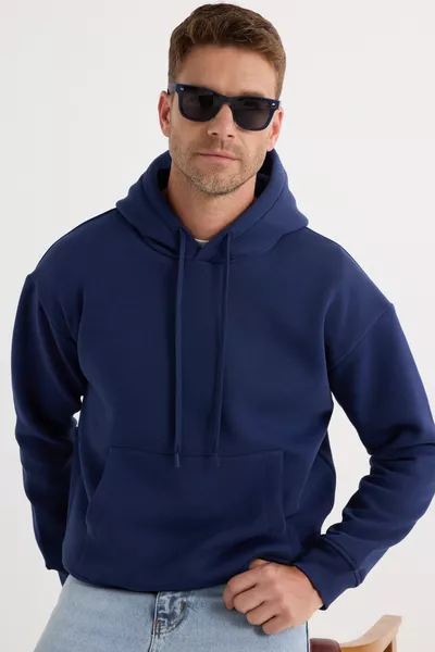 سويت شيرت بغطاء رأس أساسي باللون الأزرق الداكن، واسع الحجم للجنسين، من القطن الناعم الملمس ومبطّن من الداخل بالفليس