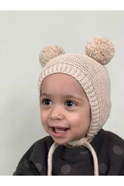 Unisex Gebreide Babymuts met Pompon - Crème