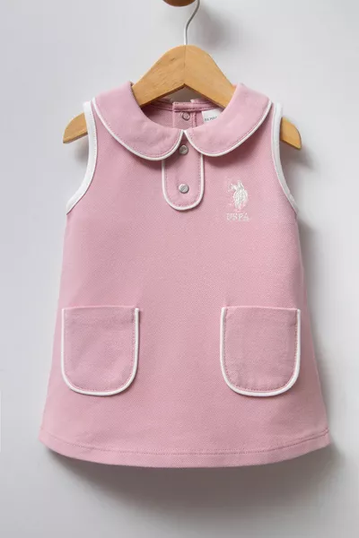فستان وردي لطفلة من U.S. Polo Assn.