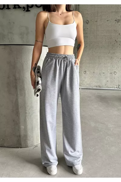 بنطال رياضي نسائي فضفاض بخصر مرتفع وقصّة واسعة