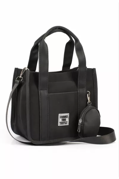 حقيبة نسائية سوداء بحمالة عابرة مع تفاصيل المحفظة