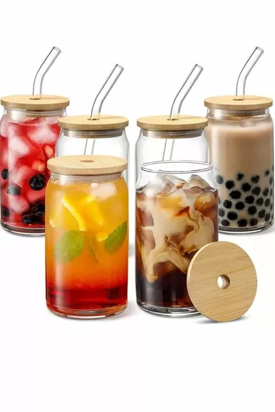 2 pieces with heat-resistant glass straws, wooden lid with valve, coffee juice cup and 1 brush