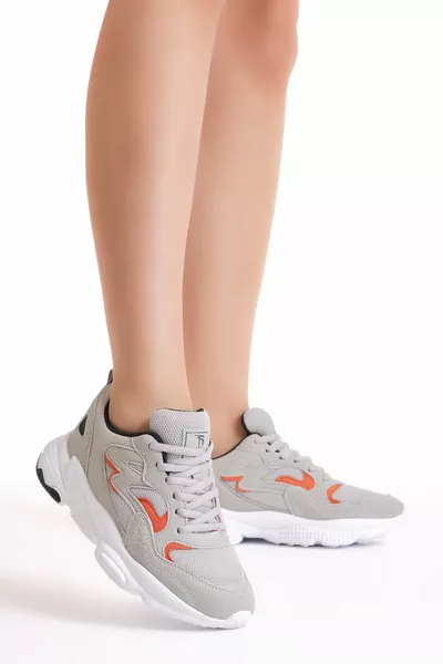 حذاء رياضي رمادي للجنسين 