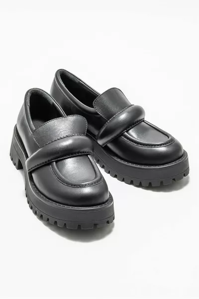 جلد أسود لوفر اليومي للنساء