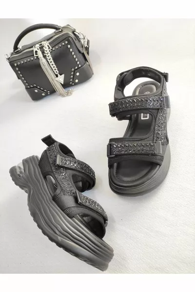 DAMESSANDALEN MET GEÏMPORTEERDE STENEN