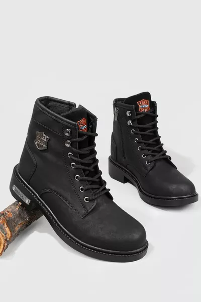 حذاء شتوي طويل مقاوم للماء للجنسين باللون الأسود بنعل مطاطي للأنشطة الخارجية 