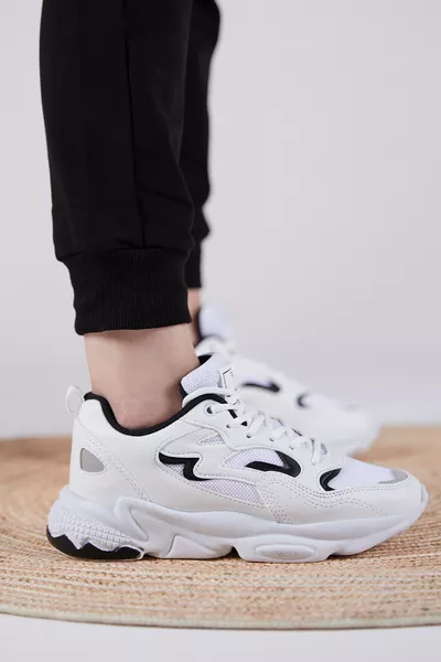 حذاء رياضي أبيض وأسود للجنسين 