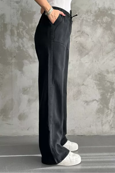 بنطال أسود بجيب وخصر مطاطي واسع الساق