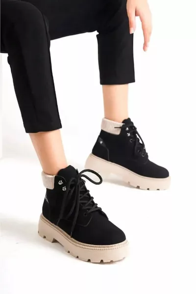 حذاء نسائي أسود من الجلد السويدي بأربطة وسطح مرتفع