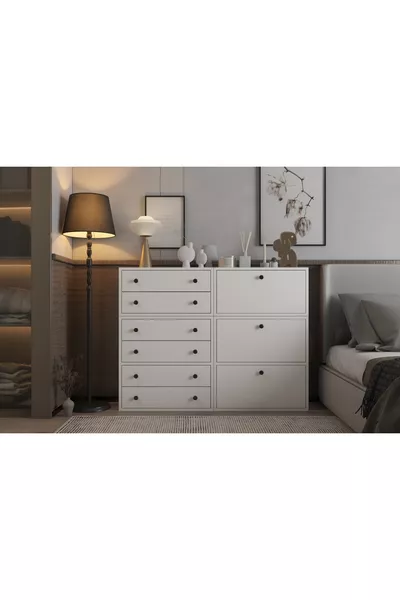 خزانة بيضاء بستة أدراج وثلاثة أبواب بدون حواف