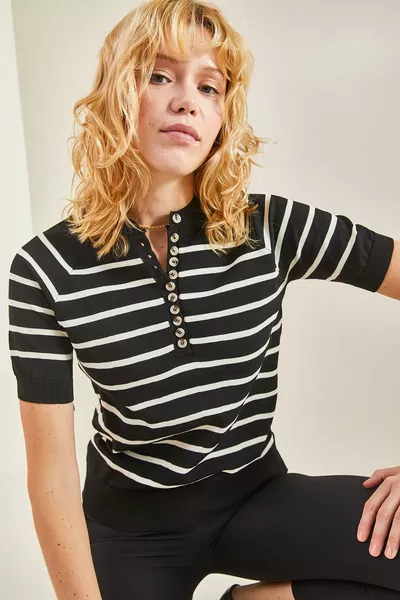 Pull en tricot pour femme avec manches boutonnées et ourlet à élastique